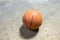 Basketball on cement floor