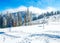 Basketball court in beautiful mountain snowy landscape.