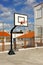 Basketball court in a schoolyard of a public primary school in holiday