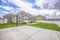 Basketball court and swings on the spacious yard of a single storey family home