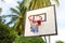 Basketball equipment on tropical island. Empty basket. Outdoor sport game.