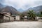 Basketball field in the valley of the village Jaibalito along lake Atitlan with misty mountains, Guatemala