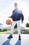 Basketball, game and black man with fashion on court while training for fitness and exercise during summer. Portrait of