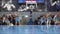 Basketball game video shooting below, players out of focus