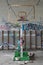 Basketball hoop in abandoned gym