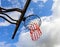 Basketball hoop on a blue sky. Basketball hoop in the public arena. Street photo, nobody, copy space for text