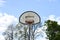 Basketball hoop with net on an outdoor basketball court