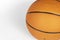 A basketball on a light background. Close-up. Selective focus