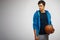 Basketball player with ball. Portrait