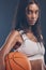 Basketball player portrait, sports workout and woman for studio challenge, practice game or fitness competition