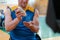 a basketball player puts anti-slip powder before the start of a basketball game