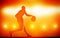 Basketball player silhouette dribbling with ball