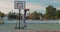 Basketball Player Training. Playing on Basketball Field. Basketball player bouncing with the ball.