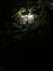 Basketball ring at night in the light of a lantern. Outdoor basketball court