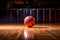 Basketball sitting on basketball court with spotlight on it. Generative AI