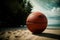 A Basketball Sitting On Top Of A Sandy Beach. Generative AI