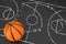 Basketball Tactics Concept. Basketball Ball over Black Chalkboard with Basketball Court and Game Strategy and Tactics Scheme. 3d