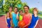 Basketball teenage team standing close after game