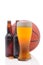 Basketball and two beer bottles and Glass