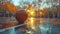 Basketball on Wet Court in Golden Autumn Sunset