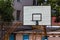 Basketball wooden backboard with a ring on an indoor yard