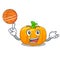 With basketball yellow pumpkin above wooden mascot table