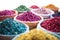 Baskets of colourful herbs and potpourri at a souk in Marrakech, Morocco