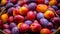 Baskets filled with vibrant multi colored plums