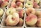 Baskets of Fresh Saturn Donut Peaches