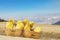 Baskets laden by natural sulfur in Kawah Ijen volcano mine