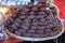 Baskets topped with dry sausages for charcuterie presentation