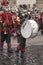 Bass drummer player in a marching band of cats at Carnival parade, Stuttgart