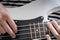 Bass guitar finger style closeup