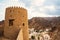 Bastion of Mutrah Fort and view of the Corniche