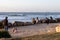 Bat Galim beach. Promenade. People enjoy the sea air. They walk, communicate with each other, play