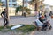 Bat Galim beach. Promenade. People enjoy the sea air. They walk, communicate with each other, play