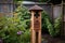 bat house attached to a garden post