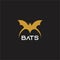 Bat logo gold and background balck