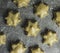 Batch of baked cinnamon star cookies - horizontal