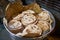 Batch of chapati round flatbreads in bucket for langar in sikh gurudwara temple, roti flatbreads