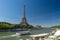 Bateau Mouche on the Seine river with Eiffel Tower in the background