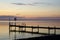 Bath bridge with lifebouy in sunset and calm water