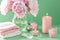 Bath and spa with peony flowers candles towels