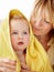 Bath, towel and baby with mother in a house for love, care and comfort, bond or routine. Family, face and mom with boy