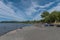 Bathers on the beach of Puyehue Lake in the municipality of Puyehue, Chile