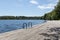 Bathing bridge by a lake near Silkeborg, Beautiful blue water with forest in the background