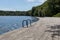 Bathing bridge by a lake near Silkeborg, Beautiful blue water with forest in the background