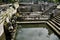 Bathing temple figures or holy water fountain of Goa Gajah or Elephant Cave significant Hindu archaeological site for travelers