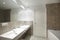 Bathrom interior with marble brown walls