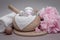 Bathroom background, accessories for face and body skin care, towels, massage and cosmetics, pink peony, relaxation and spa concep